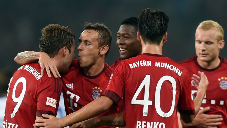 Bayern Munich's midfielder Mario Goetze (L) celebrates
