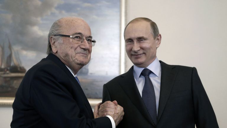 Vladimir Putin (R) meets with FIFA President Joseph Blatter