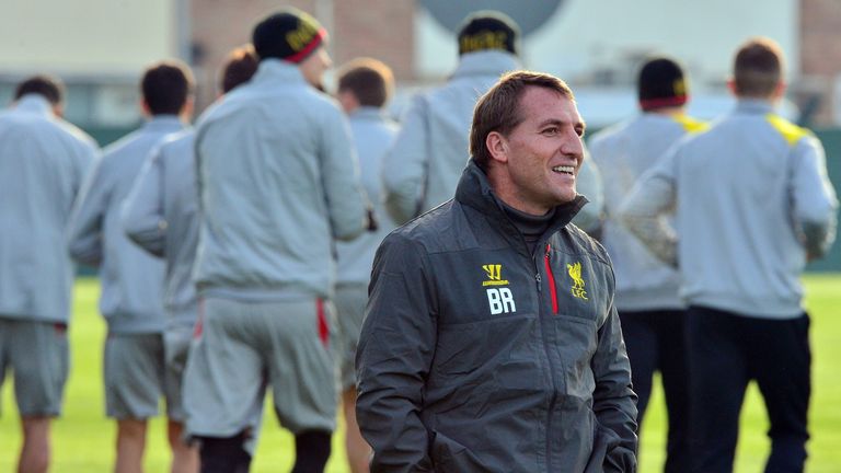 Liverpool's Northern Irish manager Brendan Rodgers (Foreground) watches a training session at their Melwood training ground in Liverpool, in 2014