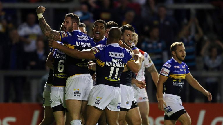 Kallum Watkins (C) of Leeds Rhinos is congratulated by his team-mates after going over for a try during the Ladbrokes Challenge Cup