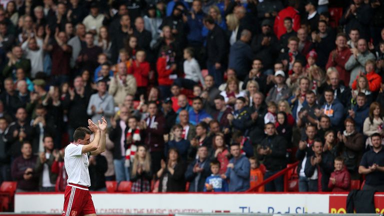 Chris Morgan applauds a 12,000-strong crowd after making his final appearance for Sheffield United