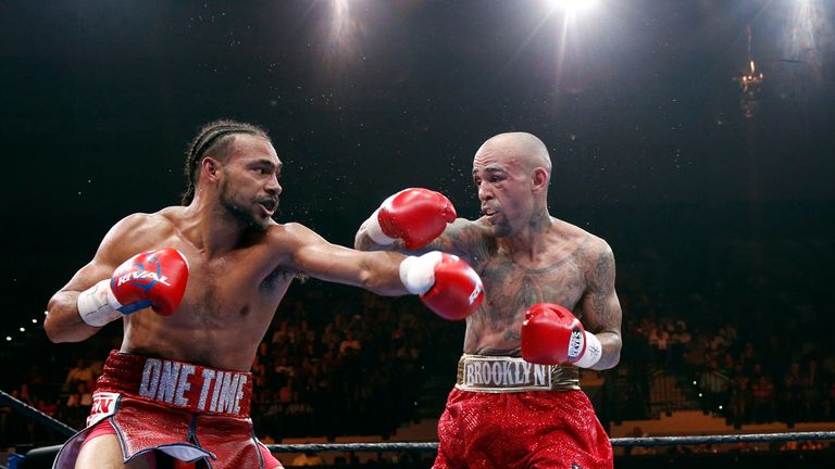 Thurman (left) exchanges blows with Collazo