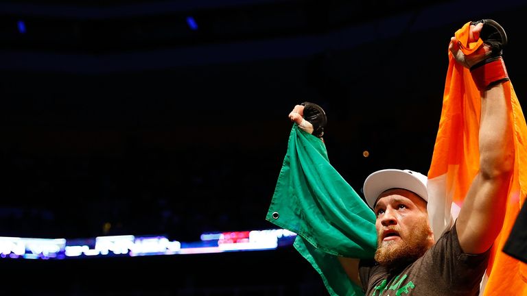 BOSTON, MA - AUGUST 17: Conor McGregor celebrates following his win against Max Holloway in their featherweight bout at TD Garden on August 17, 2013 in Bos