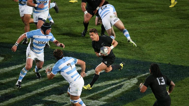 Dan Carter of the All Blacks makes a break against Argentina during The Rugby Championship