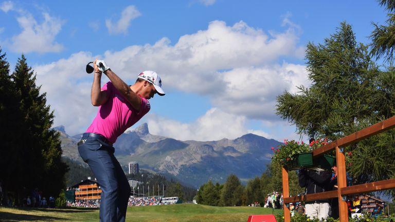 Danny Willett of England plays a shot on the 18th hole during the third round of the Omega European Masters at Crans-sur-Sierre Golf Club.