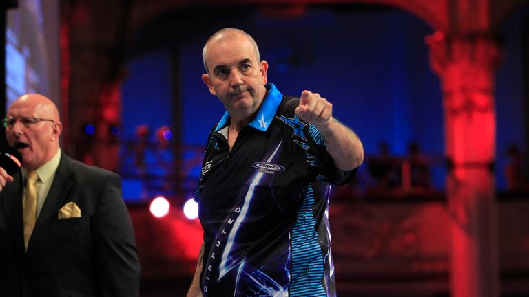 Phil Taylor beat John Henderson