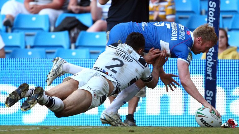 Hull KR's David Hodgson scores a try.