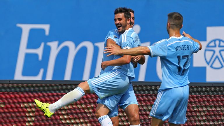 David Villa celebrates one of his two goals. 