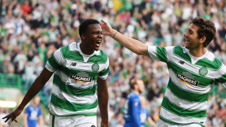 Celtic debutant Dedryck Boyata (left) celebrates his opening goal with Charlie Mulgrew