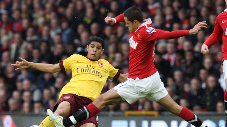 Denilson and Javier Hernandez at Old Trafford on March 12, 2011 in Manchester, England.