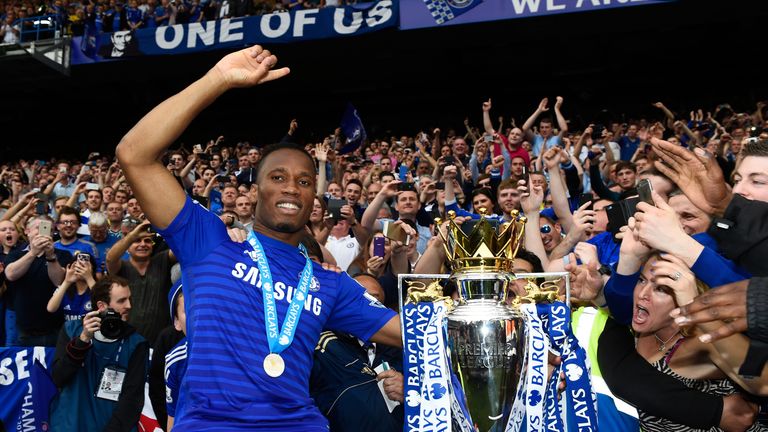 LONDON, ENGLAND - MAY 24:  Didier Drogba of Chelsea celebrates with fans and the trophy  after the Barclays Premier League match between Chelsea and Sunder