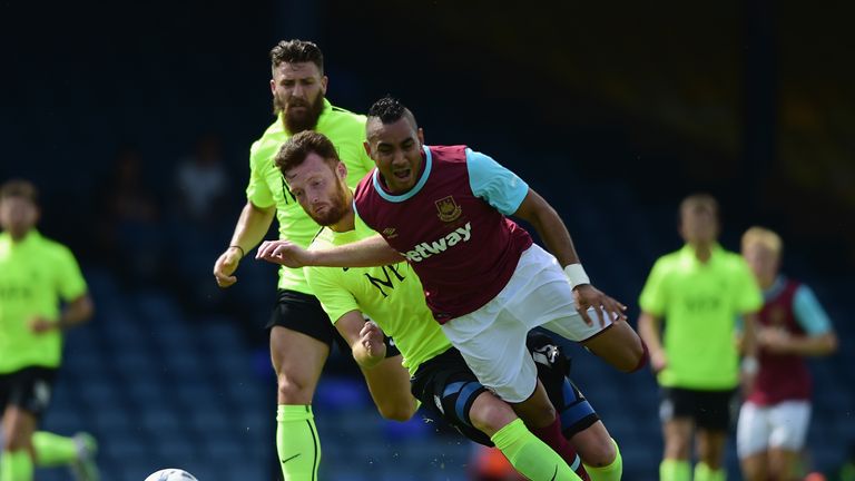 Dimitri Payet of West Ham United battles with Cian Bloger of Southend United  during the pre season friendly match between So