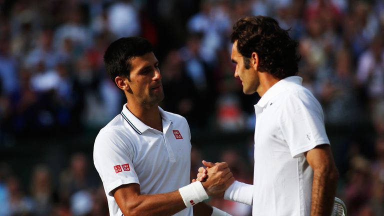 Djokovic and Federer embrace at Wimbledon