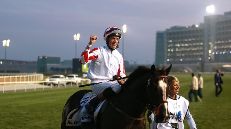 Richard Hughes celebrates ridding Sole Power to victoy in the Al Quoz Sprint during the Dubai World Cup 