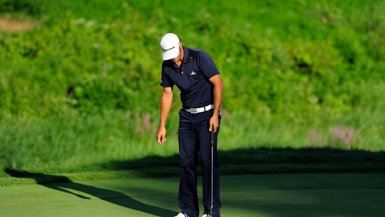 Dustin Johnson misses his par putt on the 18th green during the final round of the 92nd PGA Championship 