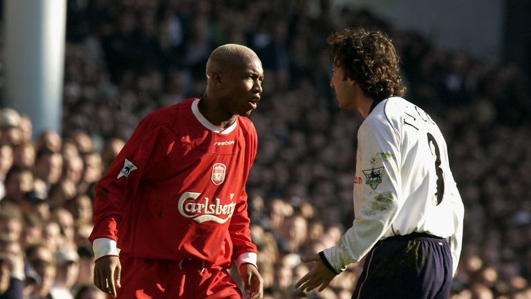 LONDON - MARCH 16:  El-Hadji Diouf of Liverpool argues with Mauricio Taricco of Tottenham Hotspur during the FA Barclaycard Premiership match between Totte