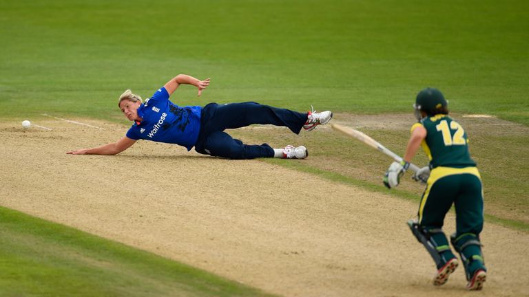 England bowler Katherine Brunt fails to stop a shot from Australia batsman Nicole Bolton