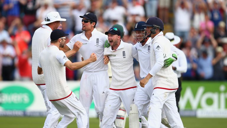 CARDIFF, WALES - JULY 11:  Alastair Cook and Adam Lyth of England and team mates celebrate victory during day four of the 1st Investec Ashes Test match bet