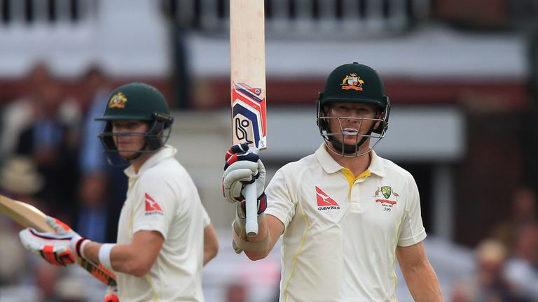 Australia batsman Chris Rogers celebrates his 150 not out with teammate Steve Smith