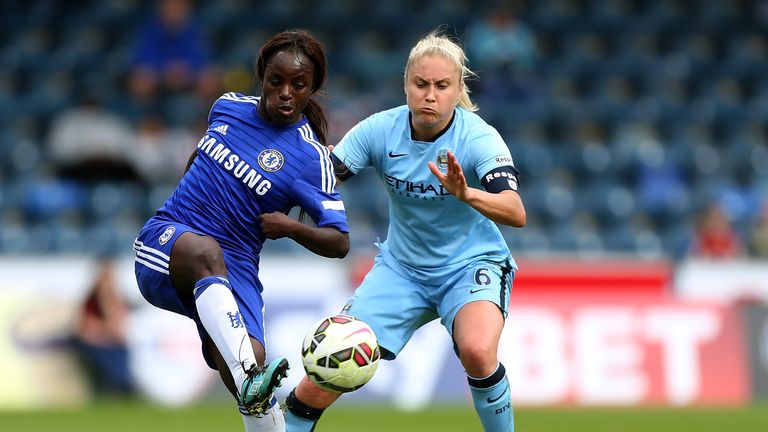 Eniola Aluko of Chelsea passes under pressure from Steph Houghton of Manchester City during the Women's FA Cup Semi Final on May 4, 2015
