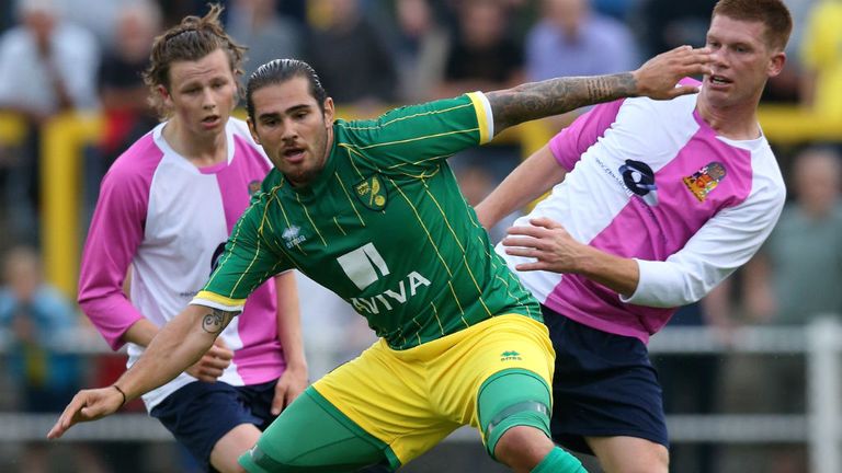 Bradley Johnson of Norwich City moves away with the ball during the pre season friendly match against Hitchin Town