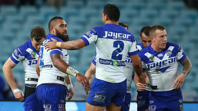 Frank Pritchard of the Bulldogs celebrates with his team mates after scoring a try against the Parramatta Eels