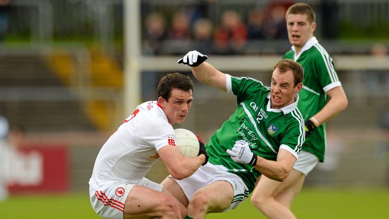 Aidan McCrory, Tyrone, in action against Sean Buckley, Limerick