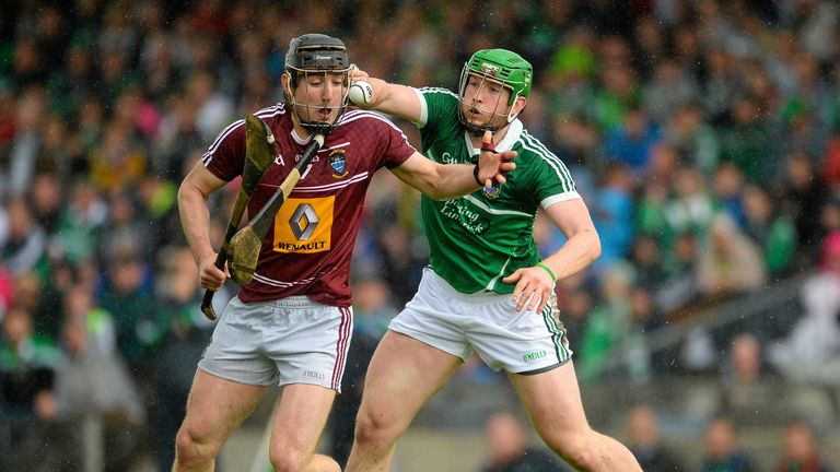 Westmeath's Alan McGrath is challenged by Shane Dowling
