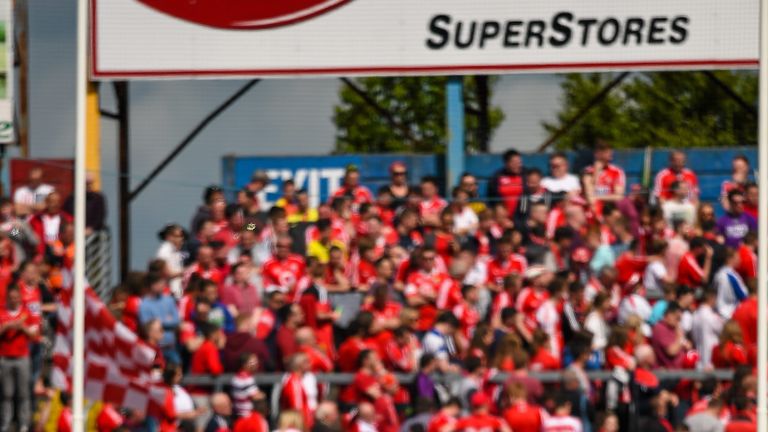 Members of the Cork team stand together for the national anthem