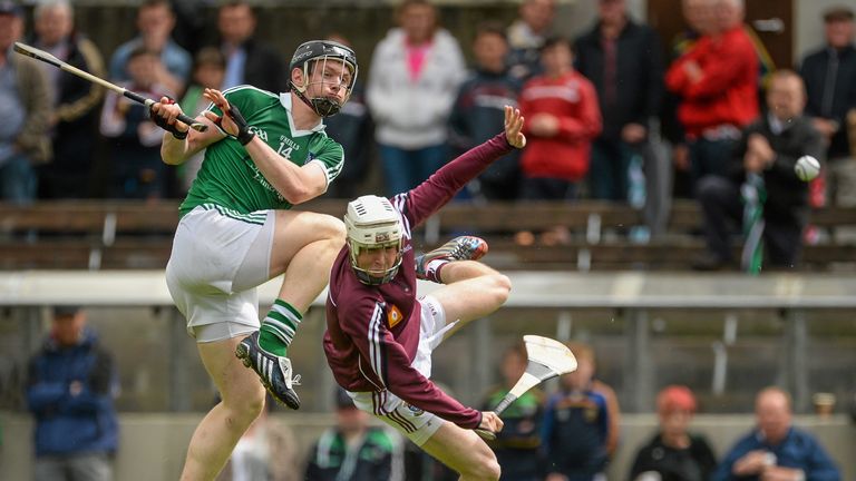 Kevin Downes and Shane McGovern compete for possession
