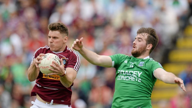 Kieran Gavin, Westmeath, in action against Sean Quigley, Fermanagh. 