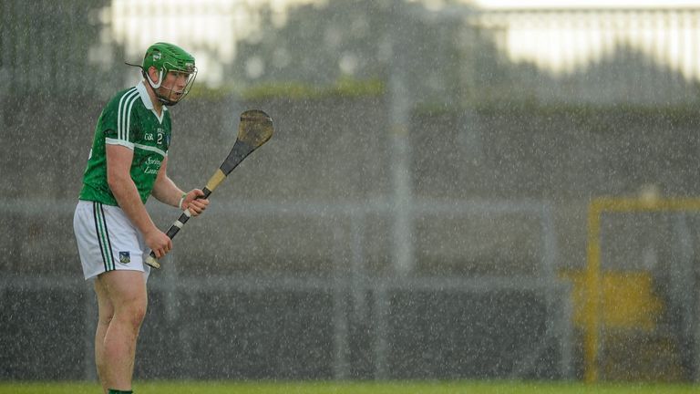Shane Dowling lines up a free during a rain shower