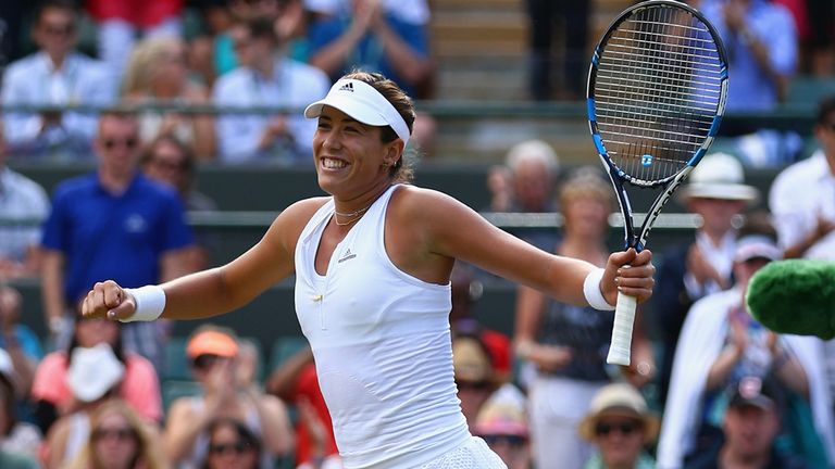 Garbine Muguruza of Spain celebrates her victory over Timea Bacsinszky 