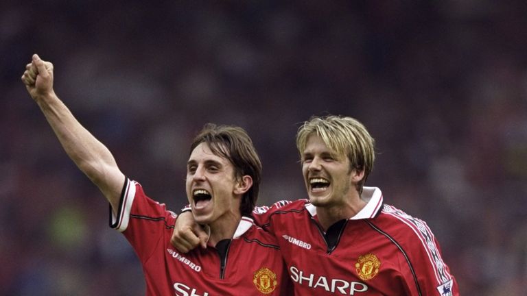 Gary Neville celebrates clinching his third Premier League title with old pal David Beckham