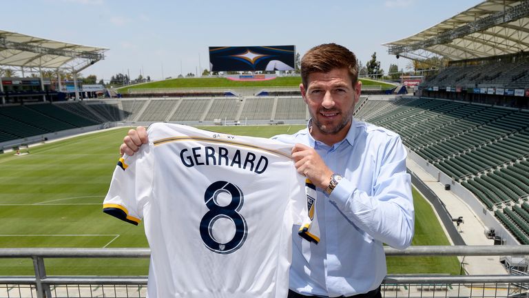 CARSON, CA - JULY 7: New Los Angeles Galaxy midfielder Steven Gerrard #8 poses with his jersey after a news conference on July 7, 2015 at StubHub Center in