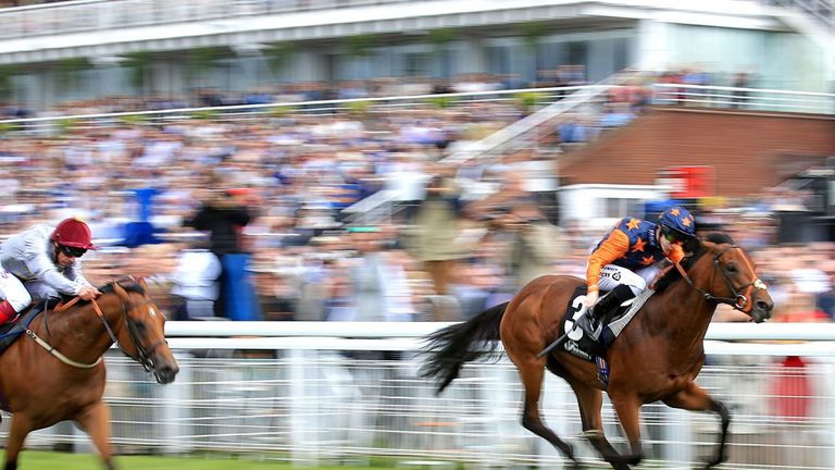 Kachy, ridden by Richard Kingscote, on his way to victory in the Fairmont Molecomb Stakes at Glorious Goodwood