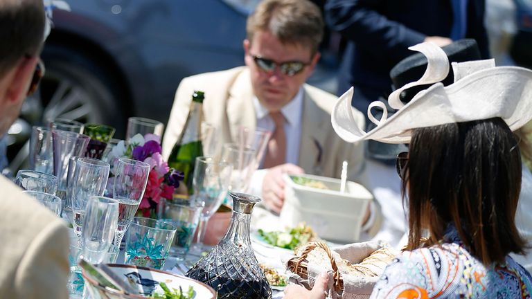 Punters enjoy a picnic in the car park ahead of the action at Glorious Goodwood