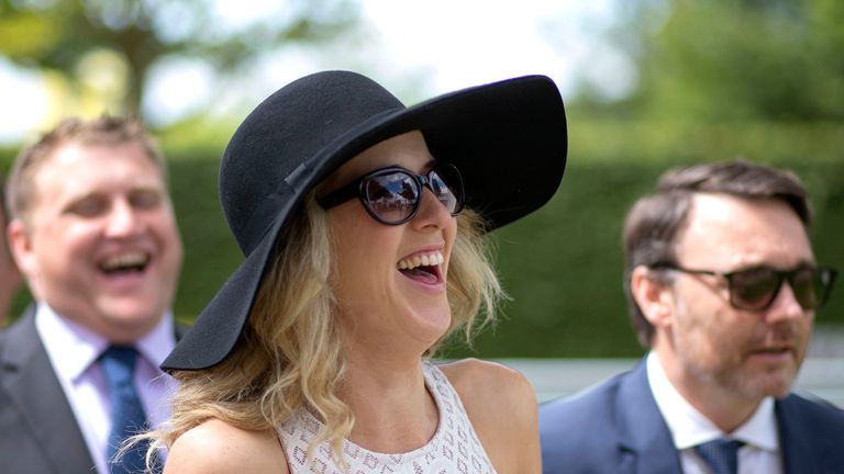 Racegoers arrive at Goodwood for the fourth day of the Qatar Goodwood Festival