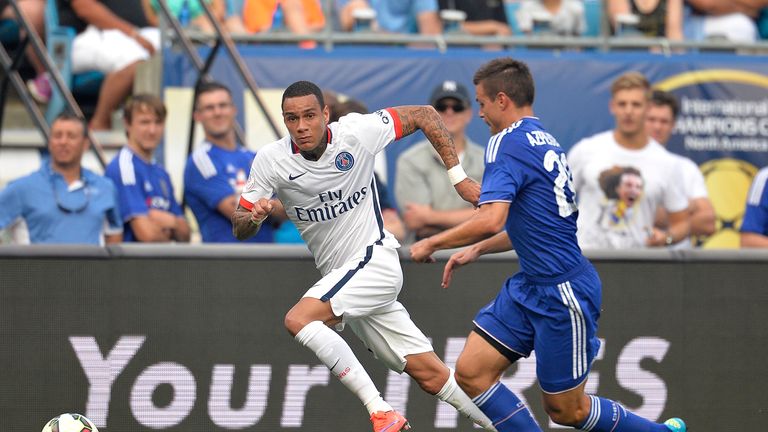 Cesar Azpilicueta #28 of Chelsea defends Gregory van der Wiel #23 of Paris Saint-Germain