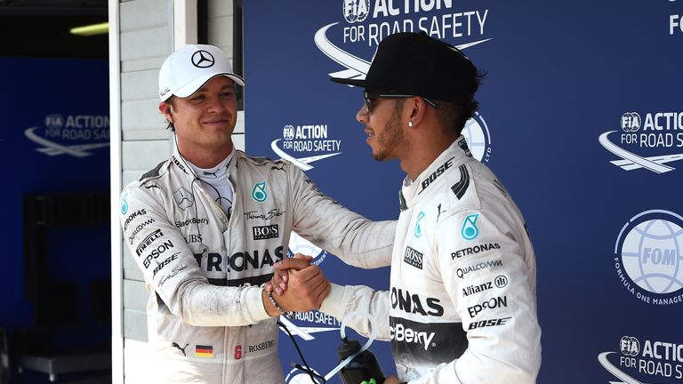 Nico Rosberg (left) congratulates pole sitter Lewis Hamilton (right)