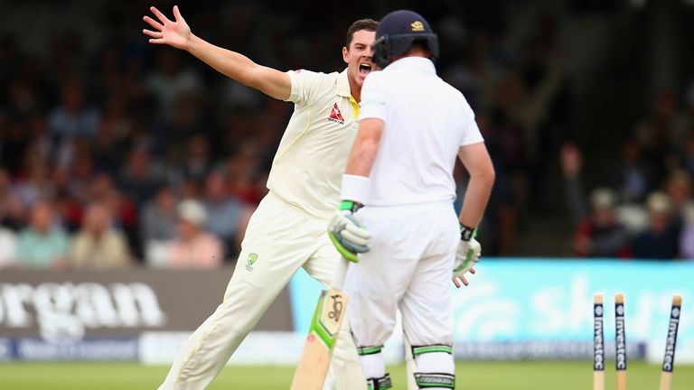 Josh Hazlewood of Australia celebrates after taking the wicket of Ian Bell 