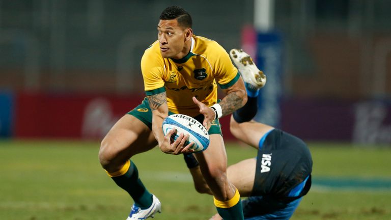 Israel Folau of Australia fights for the ball with Juan Imhoff of Argentina