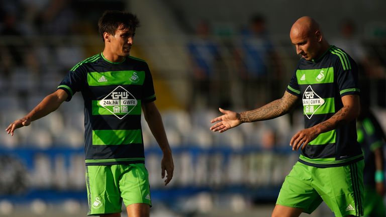 Jack Cork (L) of Swansea celebrates with team mate Jonjo Shelvey after scoring his team's first goal during the preseason frien