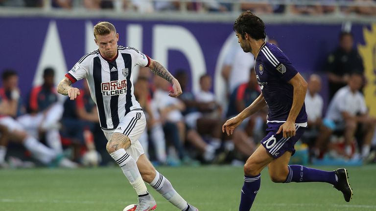 ORLANDO, FL - JULY 15:  James McClean #14 of West Bromwich Albion controls the ball in front of Kaka #10 of Orlando City SC during an International friendl