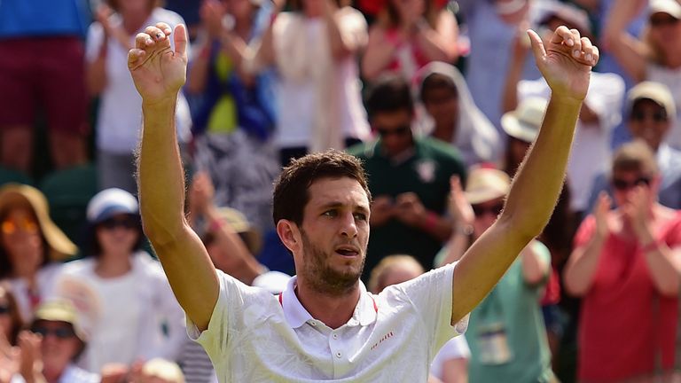 James Ward of Great Britain celebrates winning his Gentlemen's Singles second round match against Jiri Vesely of Czech Republic