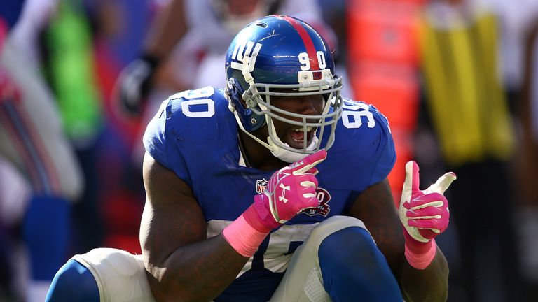 EAST RUTHERFORD, NJ - OCTOBER 05:  Defensive end Jason Pierre-Paul #90 of the New York Giants reacts after a play in the fourth quarter against the Atlanta