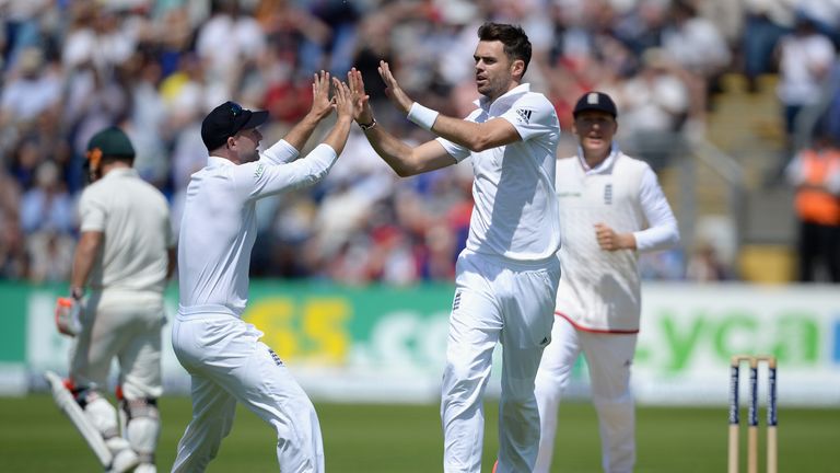 James Anderson of England celebrates with Adam Lyth after dismissing David Warner of Australia during day two of the 1st Investec Ashes Test