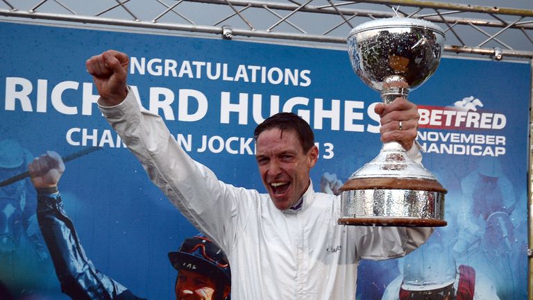 Richard Hughes gets a champagne shower as he wins the 2013 jockey's championship at Doncaster