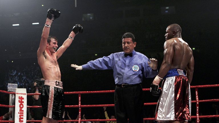 MANCHESTER, ENGLAND - MARCH 5:  Joe Calzaghe (L) celebrates his win against Jeff Lacy during the WBO and IBF super middleweight unification title fight at 
