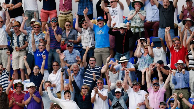 Joe Root celebrates after a catch